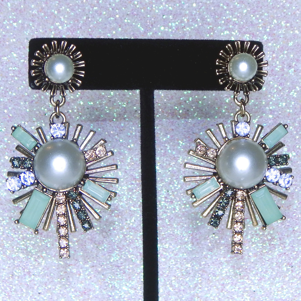 Gold star burst earrings